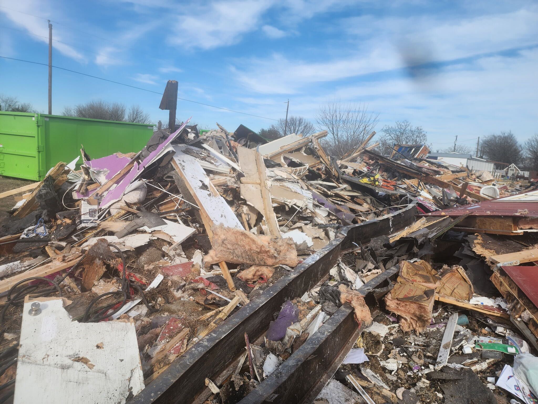 Close-up of demolition waste and construction debris being hauled by BlackIron Hauling
