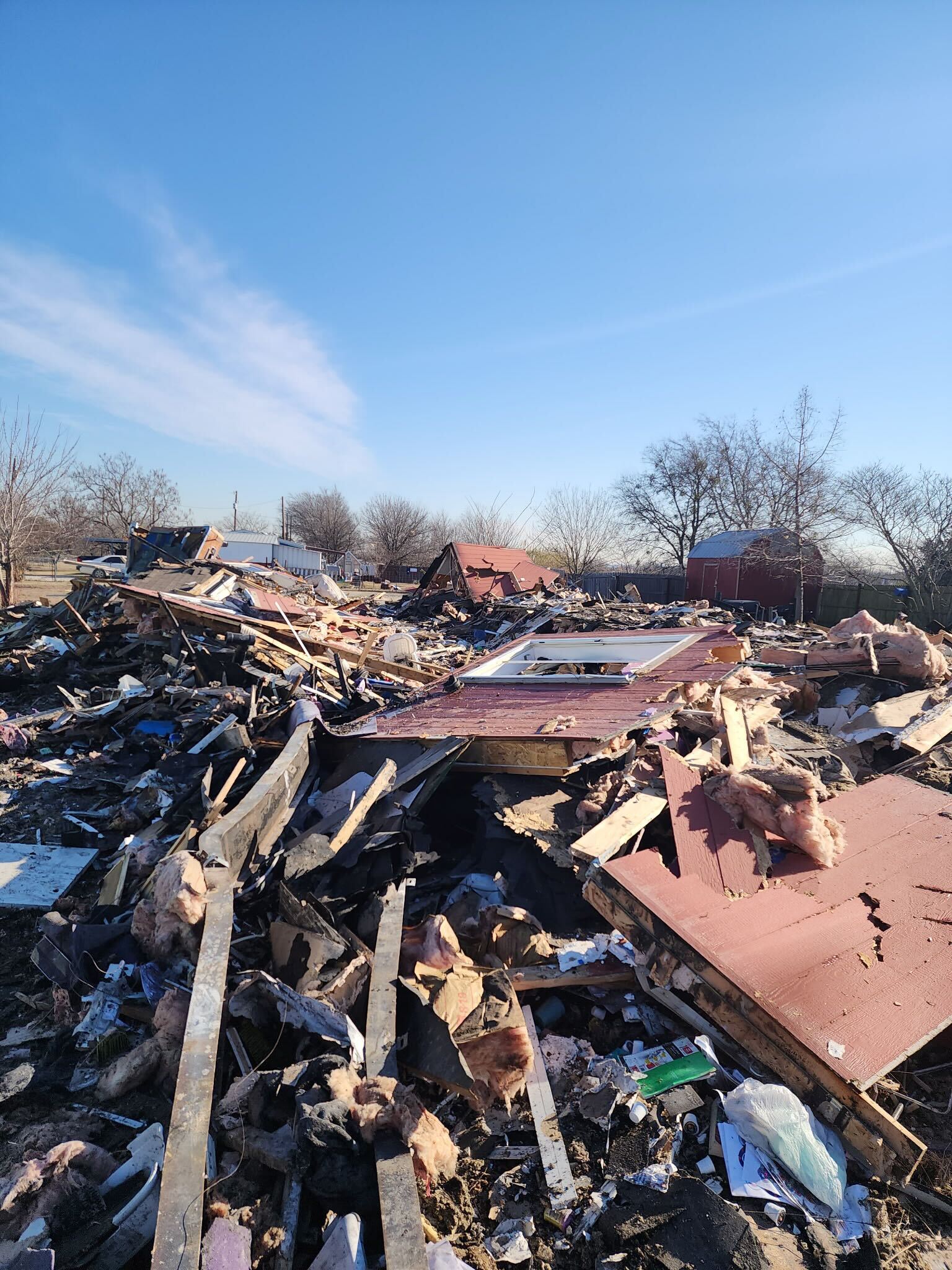 Demolition debris pile from a BlackIron Hauling junk removal job in Dallas-Fort Worth
