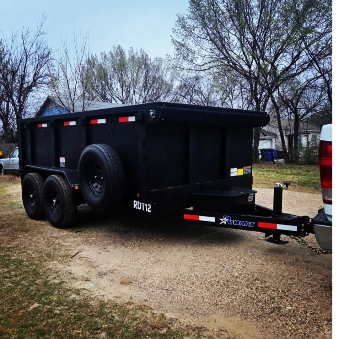 BlackIron Hauling 12-foot dump trailer front angle with R-Smart branding and hitch