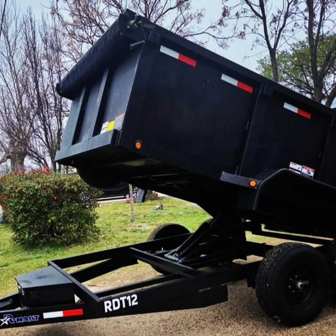 BlackIron Hauling RDT12 dump trailer with bed raised demonstrating hydraulic dump feature